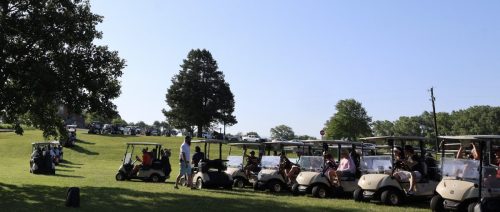 Ruff Life 2025 - golf cart group photo